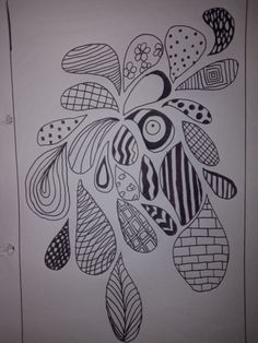 a drawing of a flower with many different designs on it