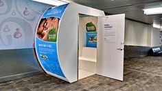 an exhibit booth in the middle of a room