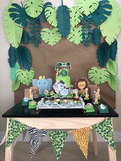 an animal themed birthday party with jungle theme