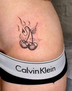 a woman with a tattoo on her stomach that says, calvin klein