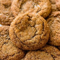 a pile of cookies sitting on top of a white plate