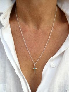 "Delicate sterling silver cross necklace, Religious jewellery gift, Small silver cross necklace This listing is for a sterling silver cross necklace. The necklace is made with sterling silver chain and closes with a sterling silver clasp. The sterling silver cross measures approx 18mm x 12mm Image length in listing at 20 inches. Available in lengths of 16\" to 20\". Please make your selection from the drop down before purchasing.  Please contact me if you have any questions. Thanks for looking. Small Silver Cross Necklace, Silver Cross Necklace Aesthetic, Boys Cross Necklace, Long Cross Necklace, Cross Necklace Simple, Cross Charm Necklace, Silver Cross Necklace, Sterling Silver Cross Necklace, Necklace Cross