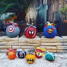 some kind of pumpkins that are painted to look like superheros