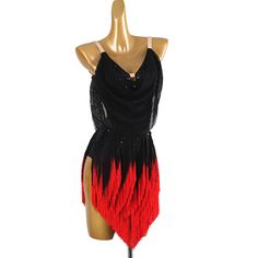 a black and red dress on a mannequin