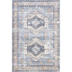 a blue and beige rug with an intricate design