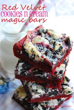 red velvet cookies and cream magic bars are stacked on top of each other