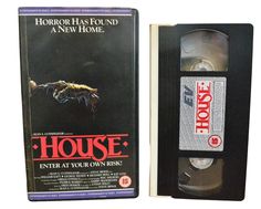 an old vhs movie with the title house on it's back and front cover