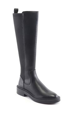 A stretchy back panel keeps you comfortable in a round-toe boot that's built on a rubber sole for added durability. 1 1/8" heel Synthetic upper and lining/rubber sole Imported Fitted Black Boots With Removable Insole, Fitted Black Boots With Lug Sole, Fitted Knee-high Boots With Removable Insole, Knee-high Boots With Lug Sole, Knee-high Polyurethane Boots Medium Width, Black Knee-high Boots With Round Toe For Riding, Black Wide Calf Synthetic Knee-high Boots, Black Ankle-high Waterproof Boots With Steel Toe, Black Knee-high Boots With Buckle Closure And Round Toe