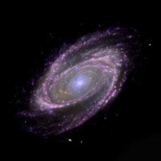 an image of a spiral galaxy in the night sky