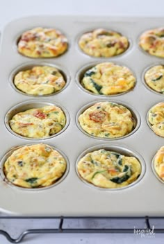 a muffin tin filled with eggs and bacon