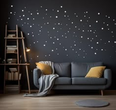 a living room with a couch and stars on the wall behind it, in front of a ladder