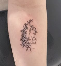 bunny tattoo delphinium flower Rabbit Tattoo With Flowers, Pet Memorial Tattoo Rabbit, Year Of Rabbit Tattoo, Bunny With Flowers Tattoo, Parsley Tattoo, Peter Rabbit Tattoo, Rabbit Paw Print, Peter Rabbit Tattoos