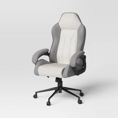 an office chair with white and grey upholstered fabric on the back, viewed from the front