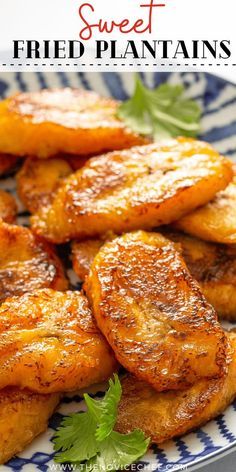 grilled plantains on a blue and white plate with parsley sprigs