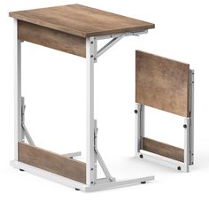 two wooden desks sitting next to each other on top of a white table with metal legs