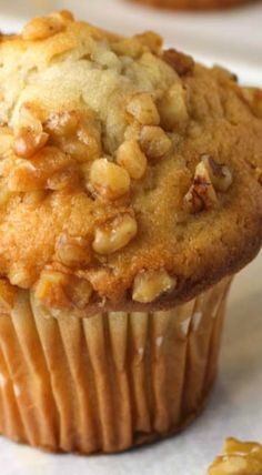 a muffin sitting on top of a white plate