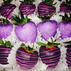 several chocolate covered strawberries are arranged in rows and stacked on top of each other