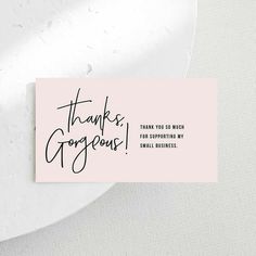 a thank card with the words thank, gorgeous on it in black and white ink