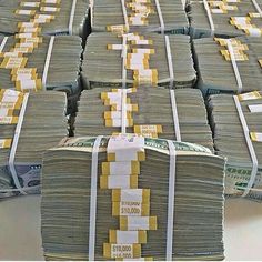 stacks of money sitting on top of each other