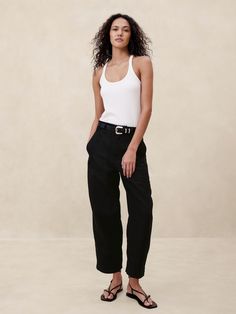 A fresh take on the classic utility pant, this vintage-inspired pair pairs back the utilitarian styling—the better to show off this beautiful fabric woven from organic cotton and luxurious linen.  High rise (11").  Relaxed fit though the thigh, tapered leg.  Ankle length.  Zip fly with book-and-bar closure.  Front and back pockets.  Unlined.  High rise (11").  Relaxed fit though the thigh, tapered leg.  Ankle length.  Ankle length.  Inseams: Short 24. 5", Regular 26. 5", Long 29. 5" Model: Size 2024 Style, Utility Pants, Cargo Pant, Luxury Linen, Retail Therapy, Bottom Clothes, Linen Pants, Beautiful Fabric, Bottoms Pants