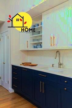 a kitchen with blue cabinets and white counter tops is shown in this image, there are no people around the room