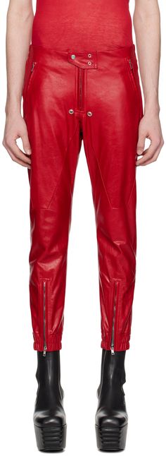 Lightweight vegetable-tanned and waxed grained calfskin pants. · Paneled construction · Partially elasticized waistband · Four-pocket styling · Press-stud tab at zip-fly · Eyelets at inseam · Zip vent at elasticized cuffs · Full cupro satin lining Supplier color: Cardinal red Mens Leather Pants, Rick Owens Men, Tapered Trousers, Straight Leg Trousers, Luxor, Rick Owens, Wide Leg Trousers, Black Pants, Calf Skin