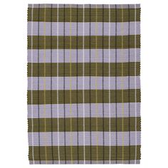 a green and purple plaid blanket on a white background