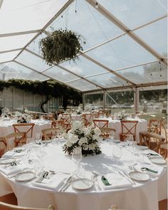 a table set up for an event under a tent