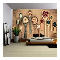 a bedroom with spoons and flowers on the wall