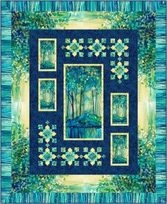 a blue quilt with green and yellow designs on the front, along with pictures of trees