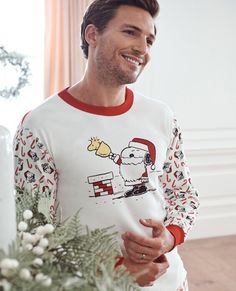 Sweet and festive adult unisex Snoopy candy cane mix-print pajama top in soft organic cotton rib knit. Made to last for holiday seasons to come! • Unique artwork only available at Hanna • Hypoallergenic & eczema-friendly • Sensory-friendly scratch-free seams that lay flat on the skin • OEKO-TEX® STANDARD 100 certified safe from hundreds of harsh chemicals 100% organic combed cotton rib knit Super-smooth flatlock seams Soft ribbed neck and cuffs Tops and pants offered separately for the very best Long Johns Pajamas, Unisex Pajamas, Sensory Friendly, Cuffed Top, Long John, Hanukkah Gifts, Sleepwear & Loungewear, Print Pajamas, Hanna Andersson