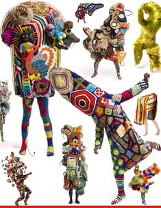 an assortment of colorfully dressed animal sculptures and figurines are featured in this image