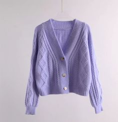 This piece is a blend of artisan skill and classic style, ideal for those chilly days or cozy nights in. Our sweater is designed with comfort in mind, featuring a soft lilac hue that invokes a sense of calm. The loose fit ensures ease of movement, while the deep V-neck adds a touch of femininity. Adorned with classic cable knit patterns, each stitch is a testament to the art of knitting. Ribbed cuffs and hem provide a snug fit, and the natural buttons add a charming vintage feel. Crafted from pr True Spring, Winter Closet, Knitting Women Cardigan, Wardrobe Planning, Short Cardigan, Knitwear Fashion, Japanese Outfits, Design Clothes, Knit Sweaters