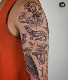 a person with a tattoo on their arm and some mushrooms in the background, including an owl