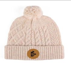 Made with soft and breathable cotton fabric, this beanie provides ultimate comfort and warmth for those chilly days. The beanie features a beautifully stitched DeemedFit logo centered on the front, adding a touch of elegance and sophistication to your outfit. Whether you're heading out for a casual day out or hitting the slopes, this beanie is the perfect addition to complete your look. Its versatile design and neutral color make it easy to pair with any outfit. Stay fashionable and comfortable. Winter Cotton Bonnet Cap, Cotton Winter Bonnet, Warm Cotton Bonnet For Winter, Warm Cotton Beanie Bonnet, Warm Cotton Hats For Cold Weather, Fleece Lined Beanie One Size, Comfortable Adjustable Beanie For Winter, Comfortable Adjustable Winter Beanie, Winter Cotton Hats