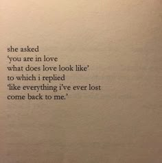 an old typewriter with the words she asked you are in love what does love look like to which i replaced like everything i've ever lost come back to me