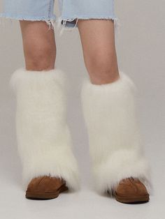 Editor's NotesPerfect winter or fall accessory, Leg warmers go over any shoe to add some stylish warmth for your legs. - Elastic band at top for shaggy fit- Pull on closure- Made from faux fur - incredibly warm and comfortable. Measurements(in.)- Size: 5.5 in. W x 18 in. H *Model Height 5' 6Composition & Care- 80% Acrylic, 20% Polyester - Hand Wash- Do Not Tumble Dry- Do Not Iron- Do Not Clean Designer- by GAC Snug Footless Winter Socks, Leg Warmer, Fashion Catalogue, Fall Accessories, Leg Warmers, Elastic Band, Tumble Dryer, Faux Fur, Women Accessories