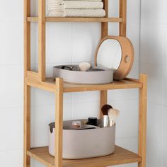 three tiered shelving unit with various items on it