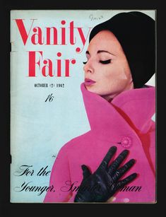 the cover of vanity fair magazine with a woman wearing a pink coat and black gloves