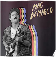 a man singing into a microphone with the words mac demaro in front of him