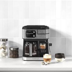 a coffee maker sitting on top of a counter