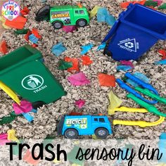 trash cans and toys on the ground with words trash sensory fun for toddlers to play in