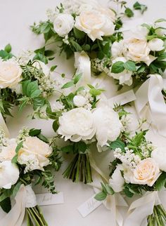 wedding bouquets laid out on a table