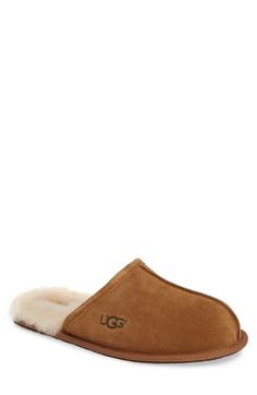 This versatile suede slipper is lined with both genuine shearling and UGGpure, a textile made entirely from wool to feel and wear like genuine shearling Slight dye transfer may occur with darker colors during first few wears Leather upper/genuine-shearling and UGGpure wool backed with recycled-polyester lining/synthetic sole Shearling may be sourced from Australia, Ireland, Spain, the UK or the USA. See packaging for confirmed country of origin Imported Classic Shearling Slip-on Slippers, Classic Brown Sheepskin Slippers, Classic Brown Slippers With Suede Lining, Classic Shearling Slippers For Winter, Classic Winter Slippers With Suede Lining, Brown Suede Indoor Slippers, Classic Slippers With Sheepskin And Suede Lining, Classic Suede Winter Slippers, Classic Sheepskin Slippers With Suede Lining