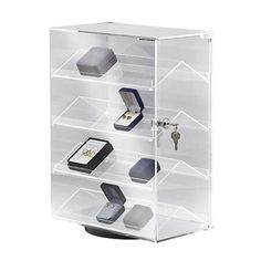 an acrylic display case with various items on it's sides and doors