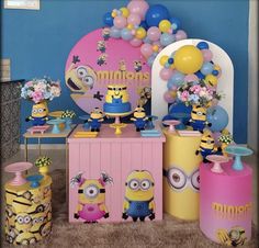 a birthday party with minion decorations and balloons