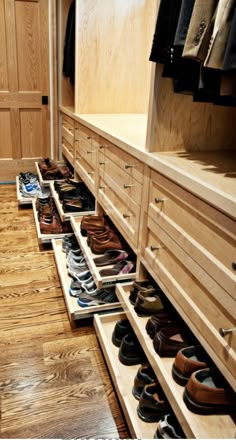 there are many pairs of shoes in the closet