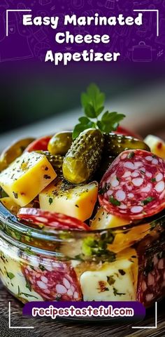 a glass bowl filled with different types of cheese and pickles on top of a wooden table