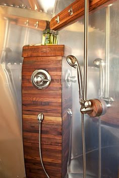 Amazing remodel of an Airstream shower. Redwood contrasts with the metal beautifully. Airstream Bathroom, Kenny Dorham, Airstream Campers, Camping Vintage, Airstream Remodel, Airstream Trailer, Airstream Interior, Airstream Renovation, Trailer Interior