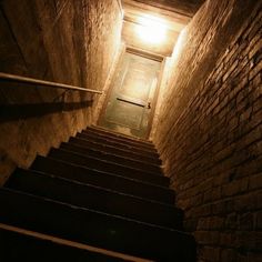 the stairs lead up to the light at the end of the tunnel that is lit